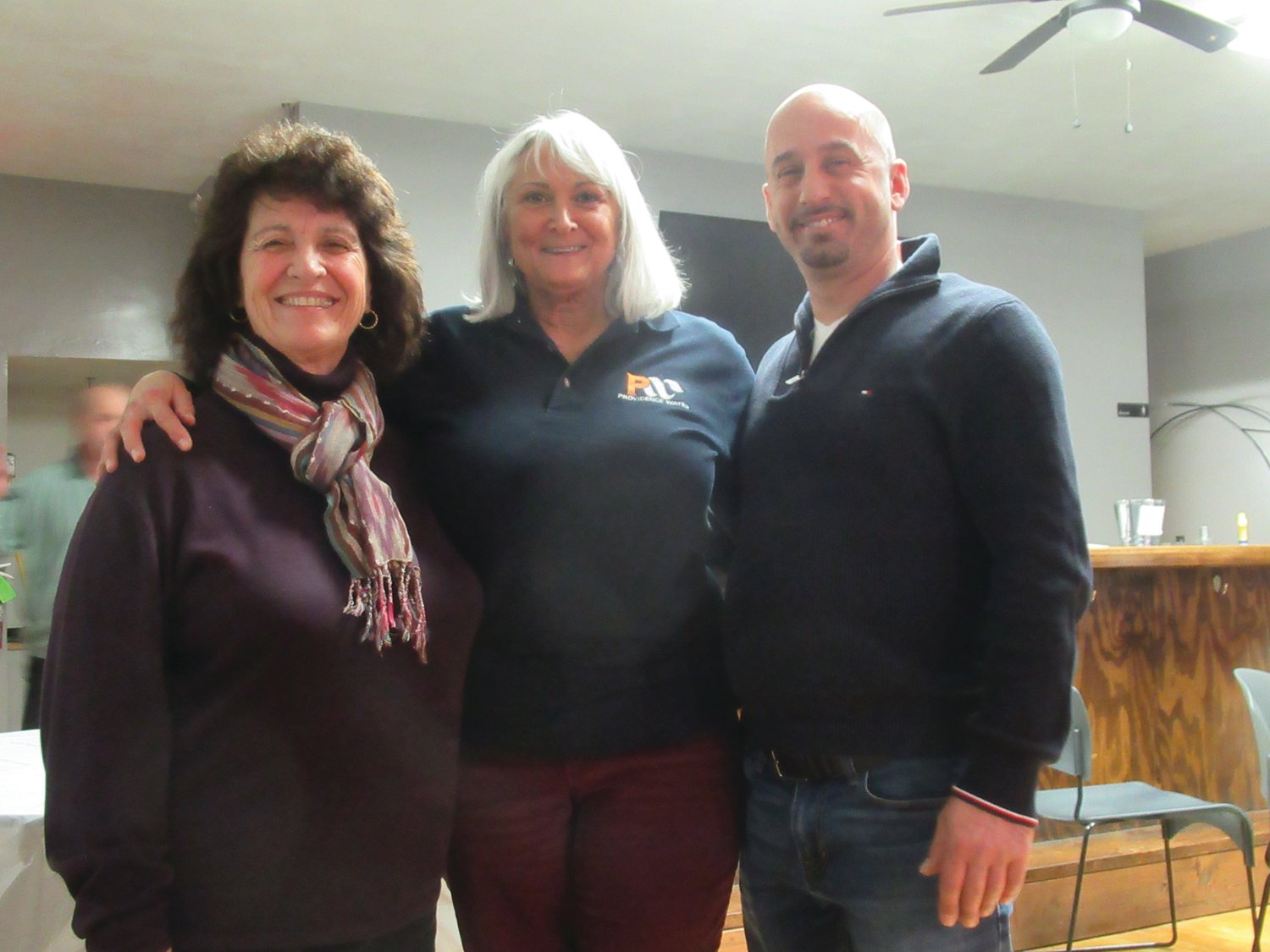 WARM WELCOME: Lauren Garzone (center) Vice President of the Johnston Town Council, is joined by Flore Turchetti and Frank DiMaio, who were elected the newest members of the Johnston Democratic Town Committee.